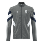 Real Madrid Jaqueta Corta-Vento 2025/26 Cinza