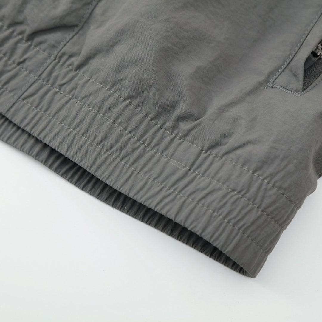 Real Madrid Jaqueta Corta-Vento 2025/26 Cinza