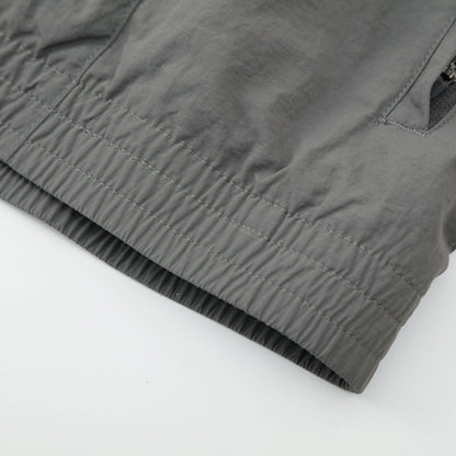 Real Madrid Jaqueta Corta-Vento 2025/26 Cinza