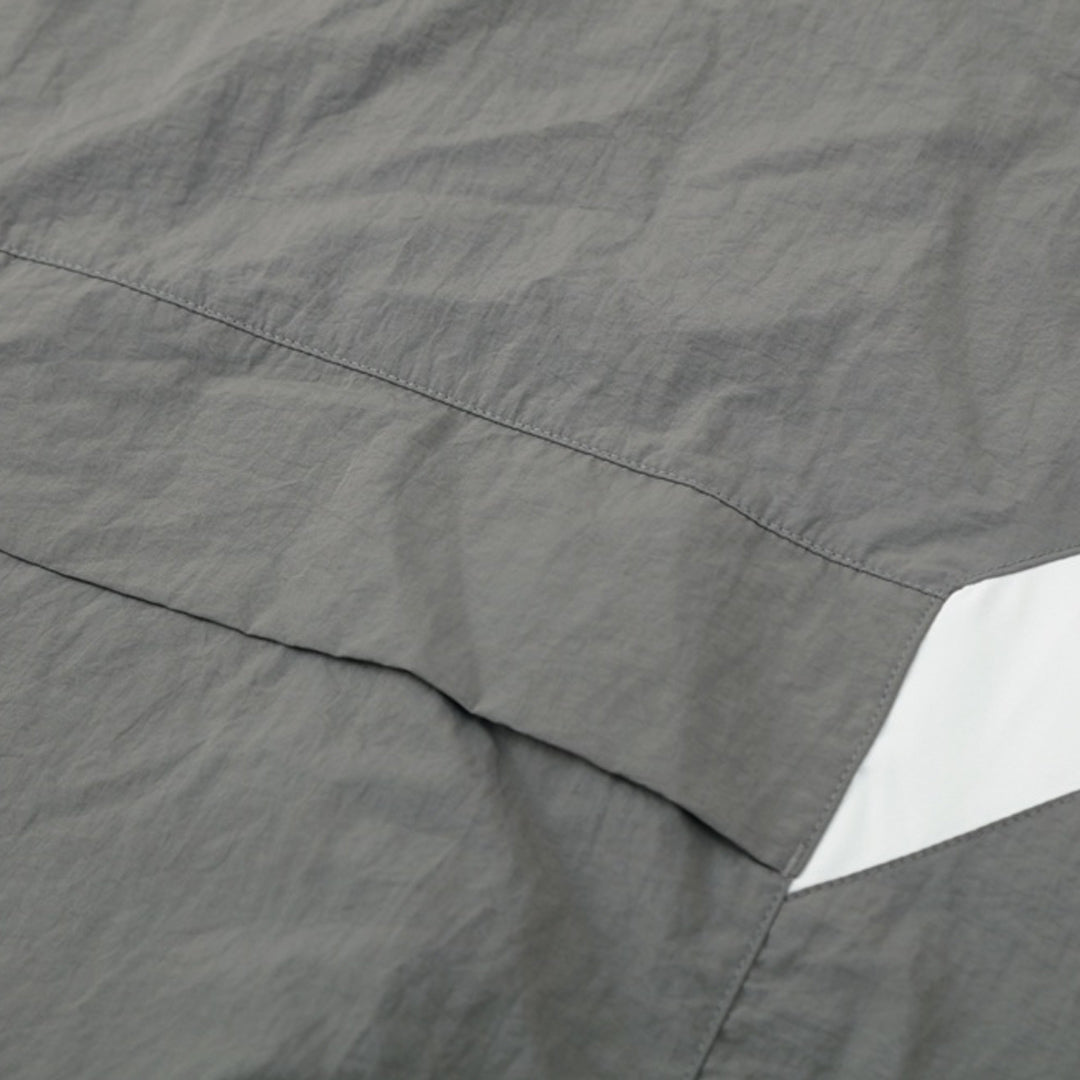 Real Madrid Jaqueta Corta-Vento 2025/26 Cinza