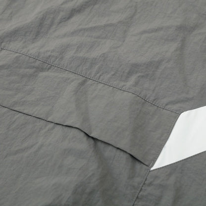 Real Madrid Jaqueta Corta-Vento 2025/26 Cinza