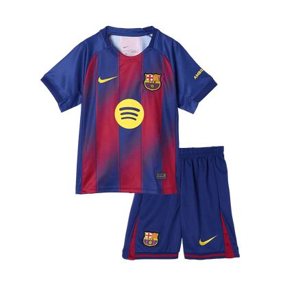 Barcelona 
Casa 
Camisas Infantis 
Conjunto 2025/26 
 Piros-Kék