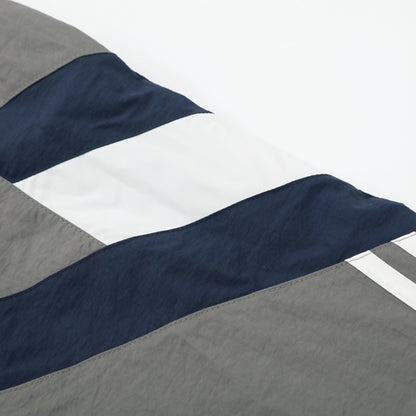 Real Madrid Jaqueta Corta-Vento 2025/26 Cinza