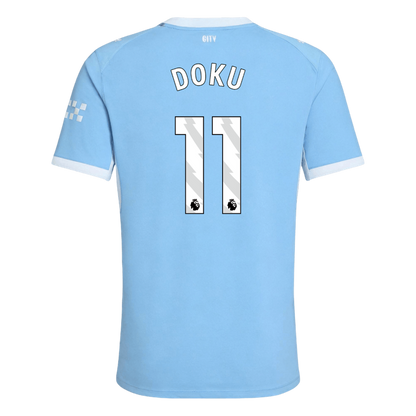 Versão do Jogador DOKU #11 Manchester City Casa Futebol Camisas 2026/27 Azul