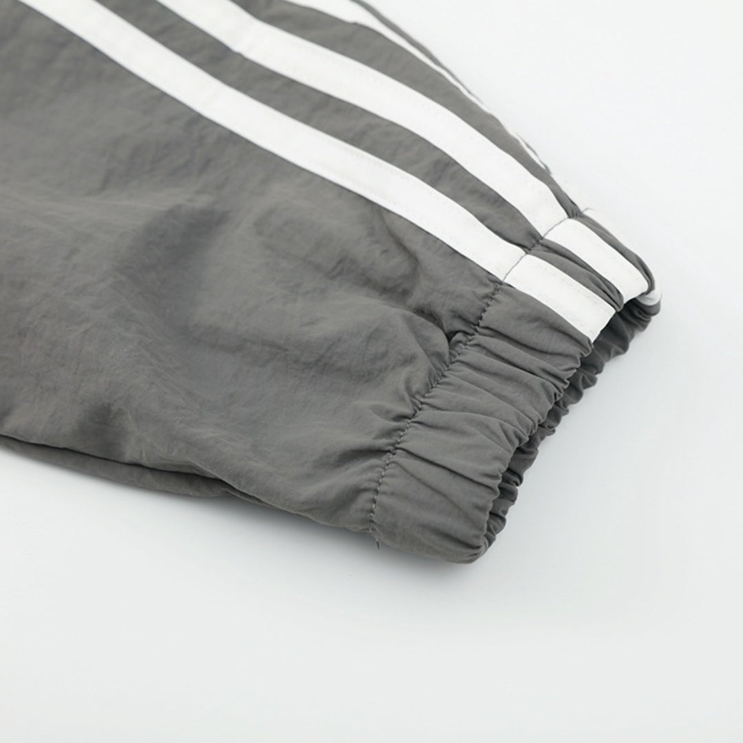 Real Madrid Jaqueta Corta-Vento 2025/26 Cinza