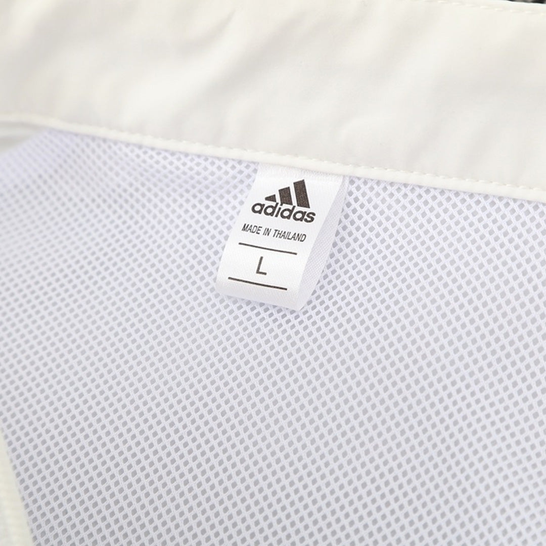 Manchester United Jaqueta Corta-Vento 2025/26 Branco